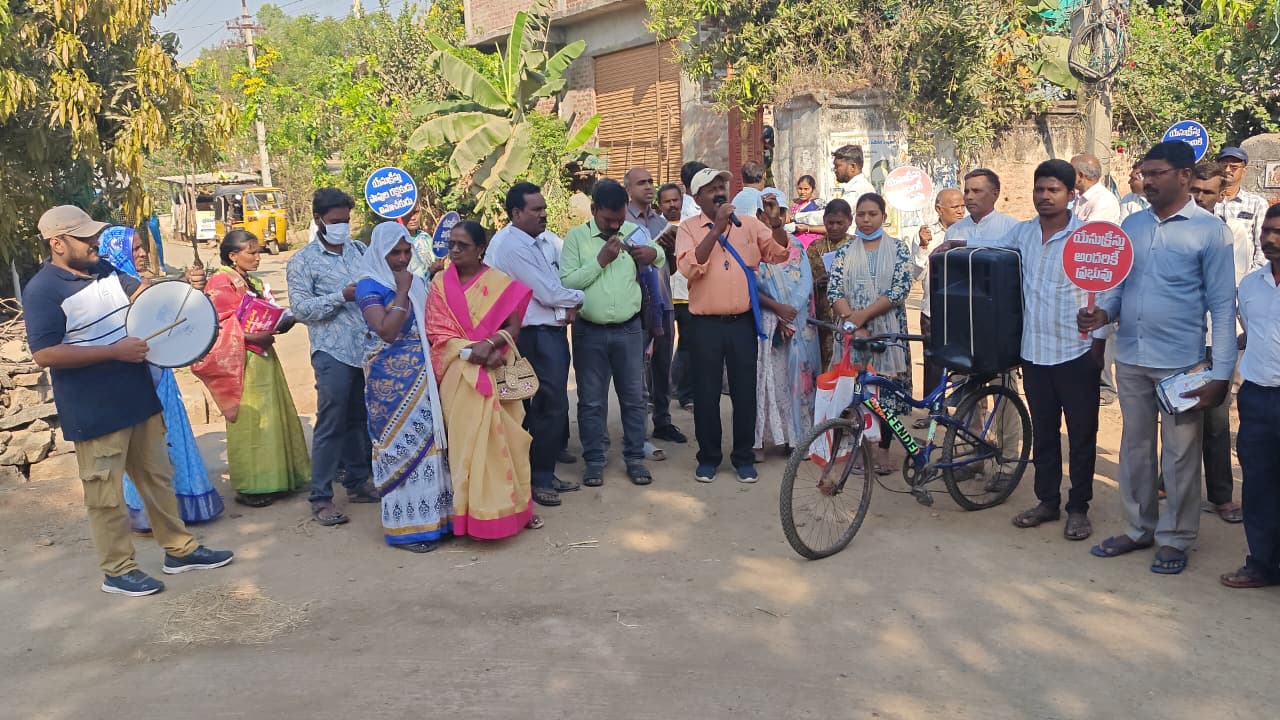 Church outreach gathering in a village street.